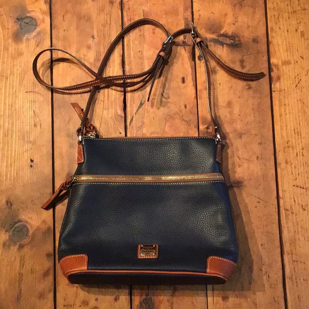 Leather purse by Dooney and bourke.